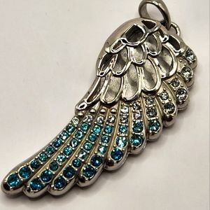 Wing shaped locket